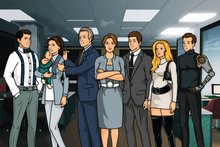 Load image into Gallery viewer, Custom Archer family portrait of 3 women, 4 men and a baby, everyone dressed as characters from the show, standing in the intelligence agency.